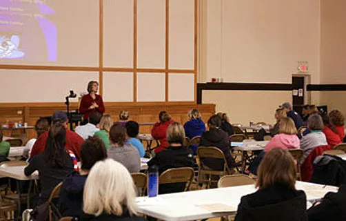 Mary conducting a workshop